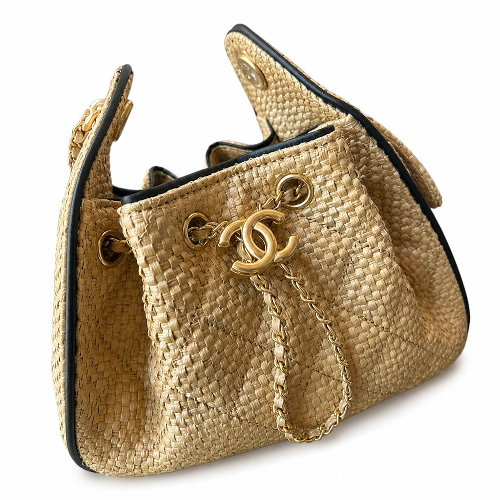 Chanel Raffia Drawstring Bucket Bag Natural Beige | Oversized Gold CC Medallion — 22cm