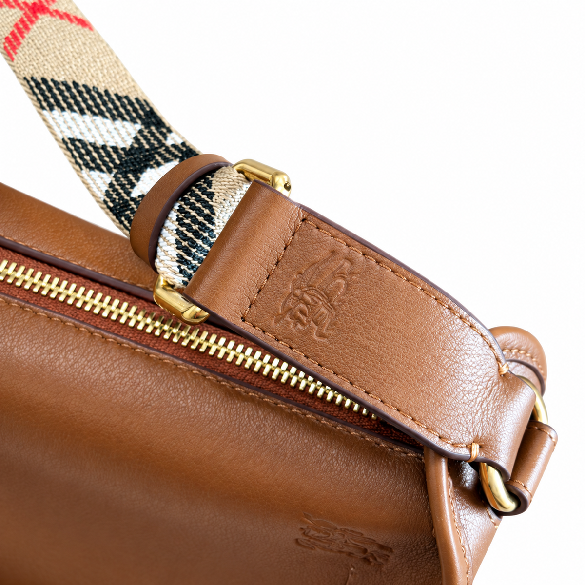 Burberry Cognac Saddle Bag with Heritage Check Strap