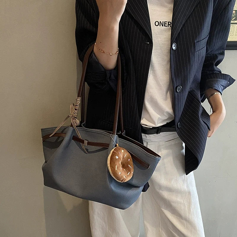 Large Grey Blue Faux Leather Tote Bag with Brown Trim Woven Bow Strap and Detachable 3D Donut Coin Charm